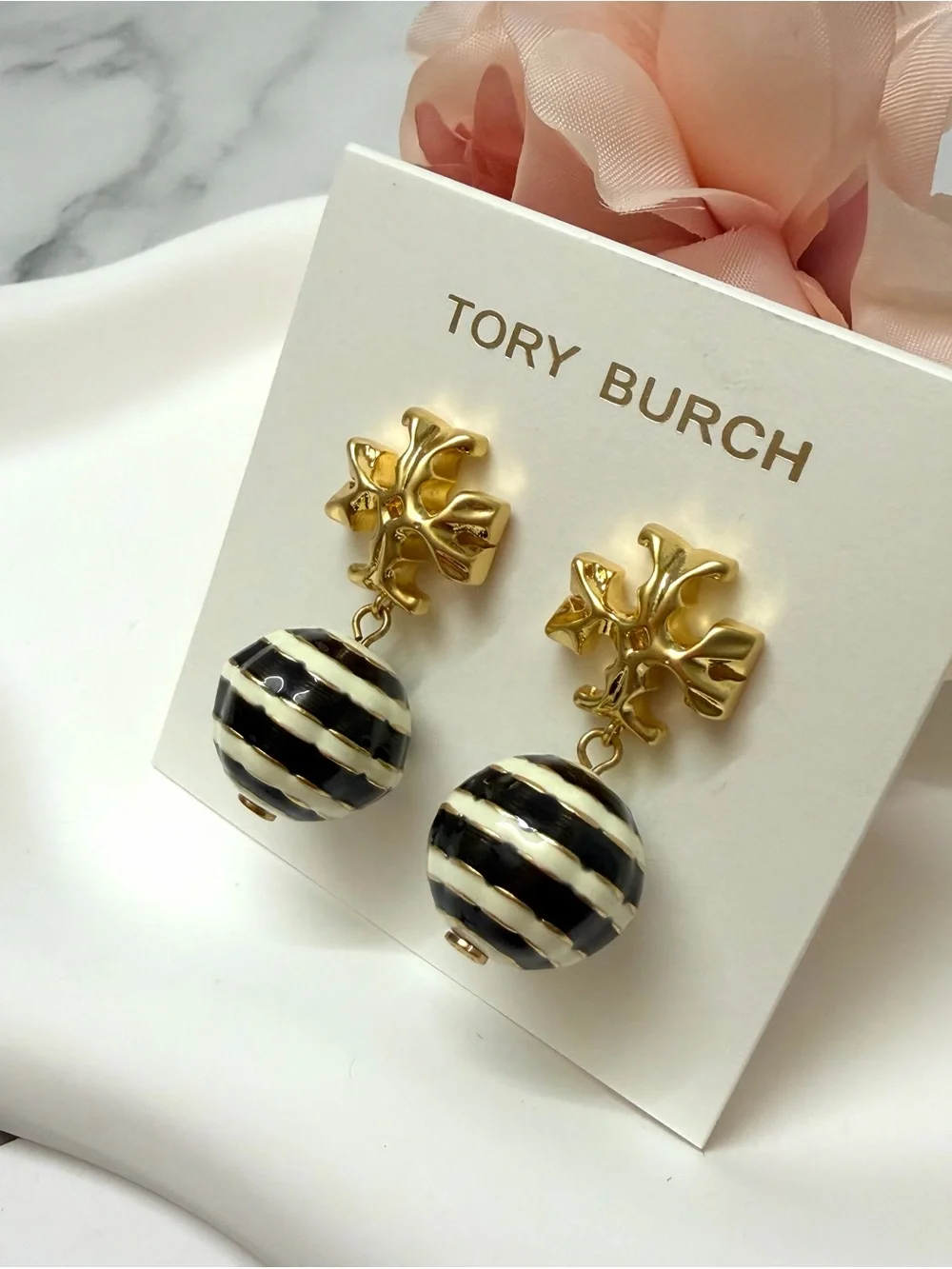 Tory Burch Gold Logo Drop Earrings with Black and White Striped Spheres